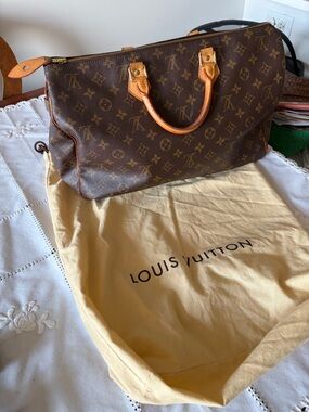 Original Vintage Luis Vuitton Speedy 40” bag.